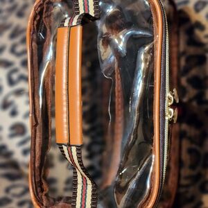 Clear Cosmetic Travel Case with Tan Trim and Striped Handle